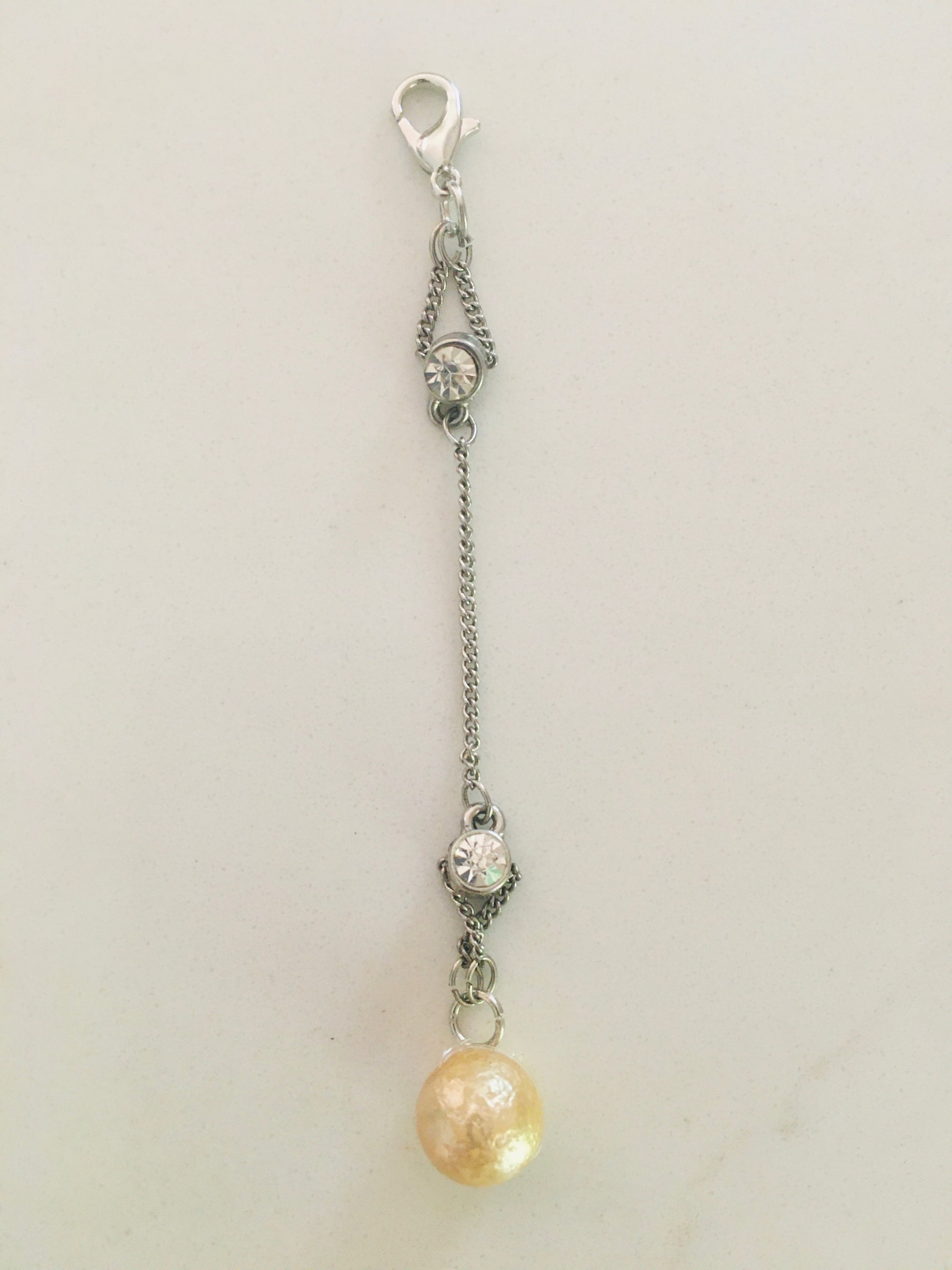 Amulet Cubic Zirconia x2  with an manmade gold pearl