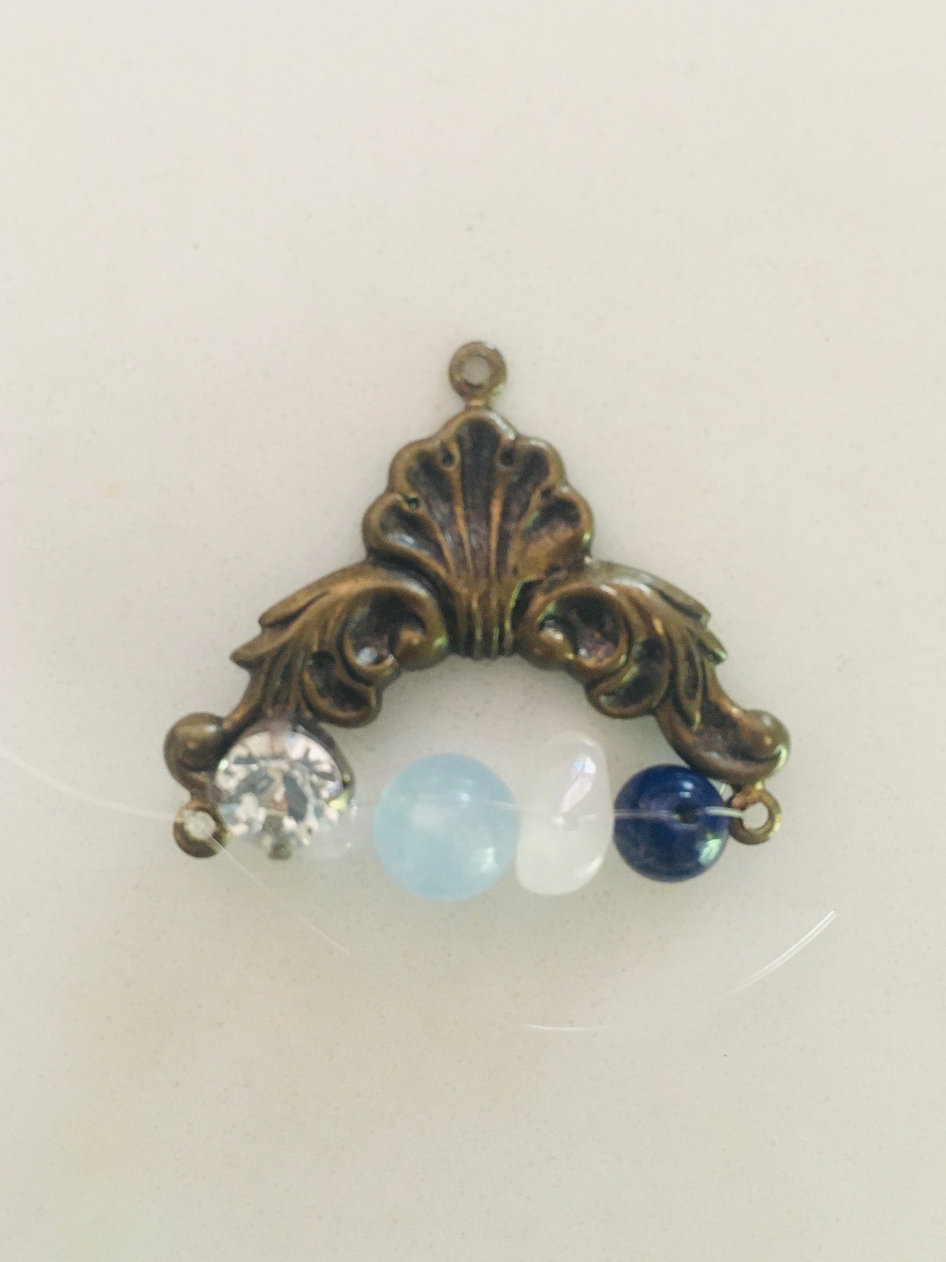 Unisex. Brass charm with Aquamarine Lapis Lazuli Rose quartz Moissanite